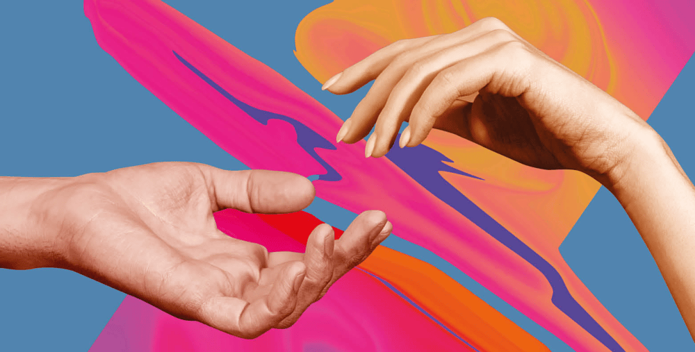 Två händer som rör vid varandra över en färgstark bakgrund.